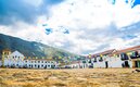 View on central square with colonia buildings in Villa de Leyva - Colombia